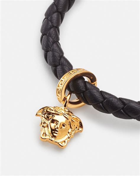 versace bangles - Versace braided leather charm bracelet.